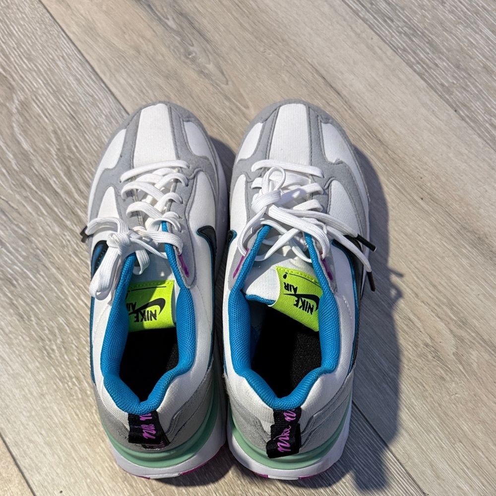 Nike womens white and Gray Sneakers with Blue Accents